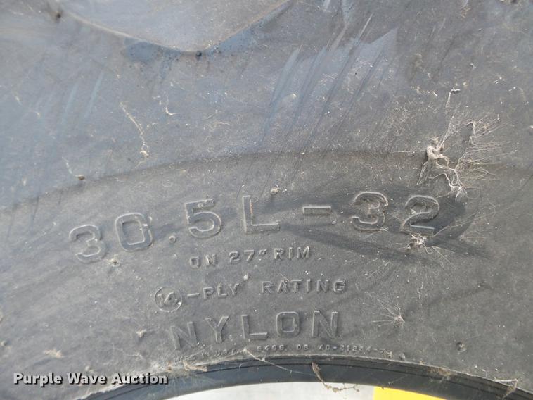 image for item CD9555 (2) Firestone R-2 30.5-32 tires