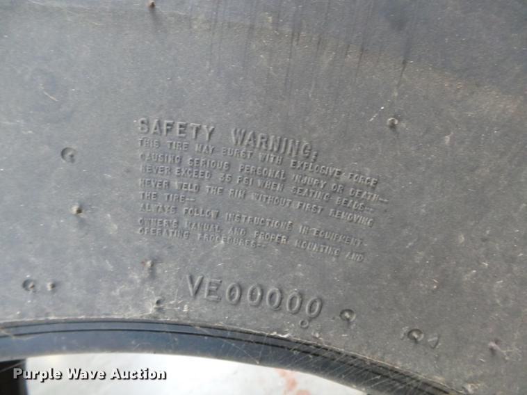 image for item CD9555 (2) Firestone R-2 30.5-32 tires