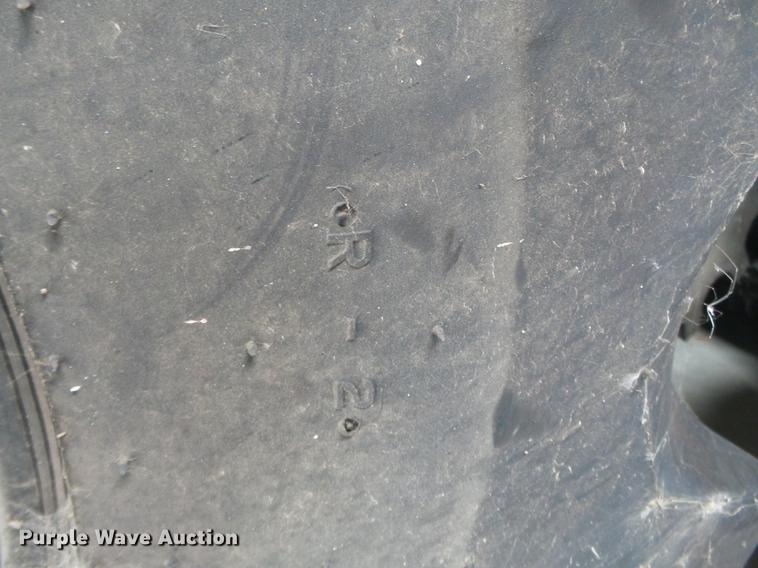 image for item CD9555 (2) Firestone R-2 30.5-32 tires