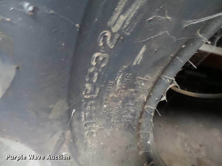 image for item CD9555 (2) Firestone R-2 30.5-32 tires