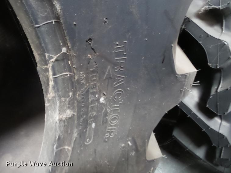 image for item CD9555 (2) Firestone R-2 30.5-32 tires