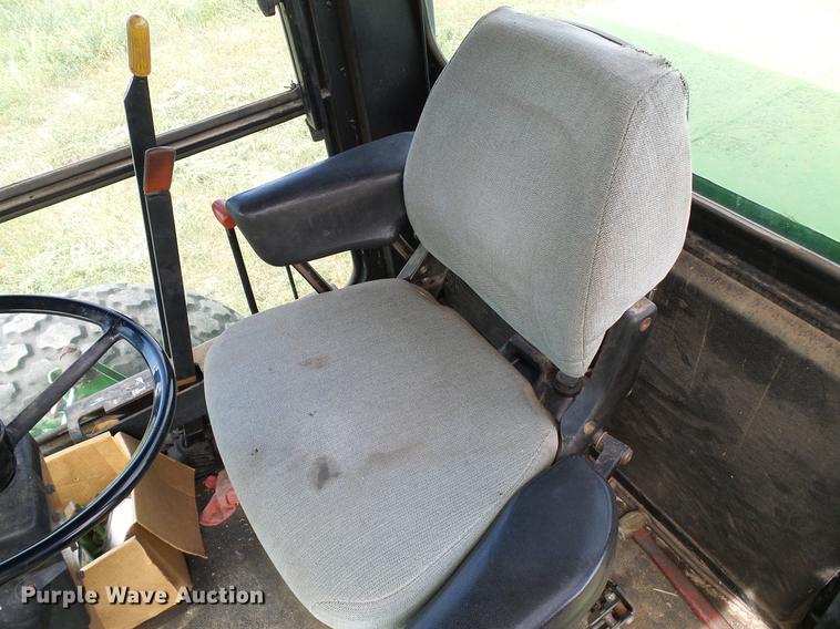 image for item DD8340 1994 John Deere 3830 windrower