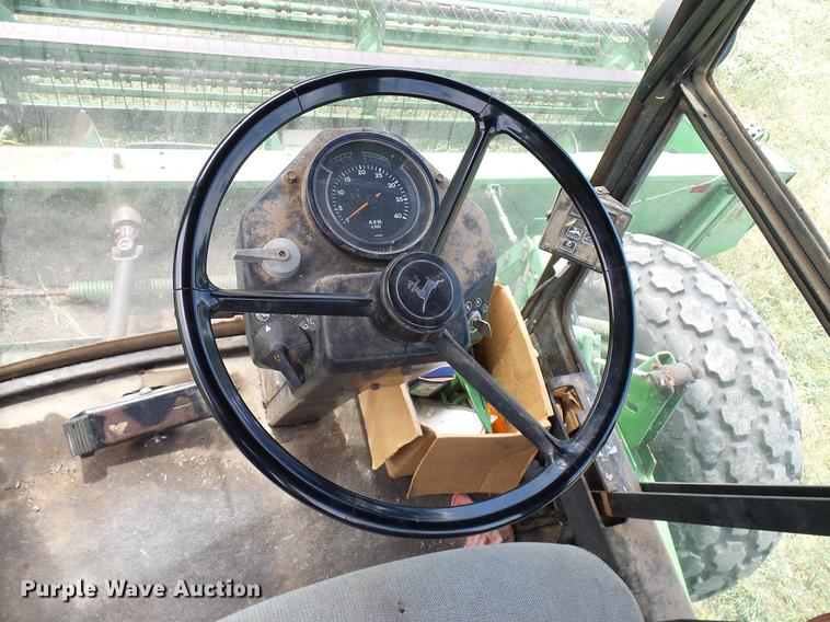 image for item DD8340 1994 John Deere 3830 windrower