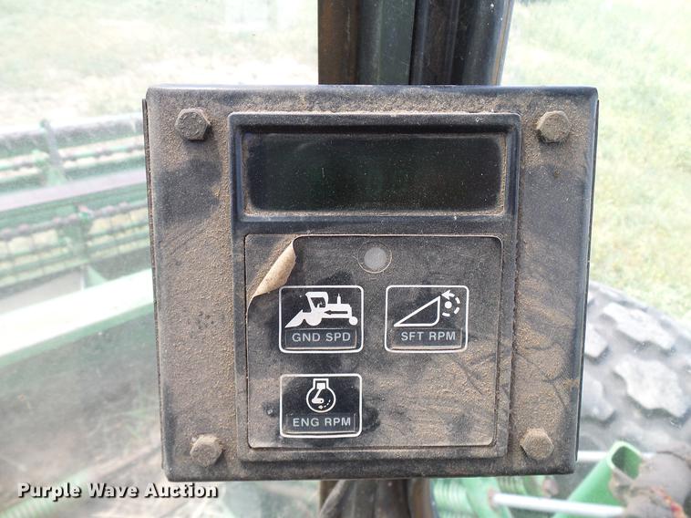 image for item DD8340 1994 John Deere 3830 windrower