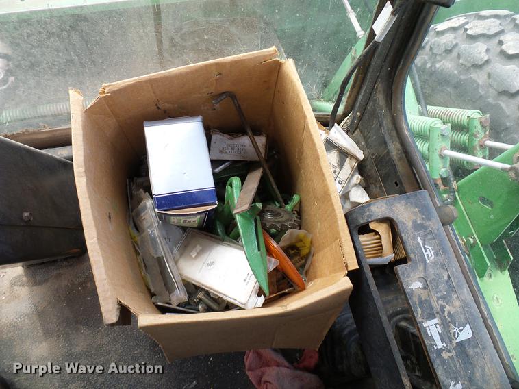 image for item DD8340 1994 John Deere 3830 windrower