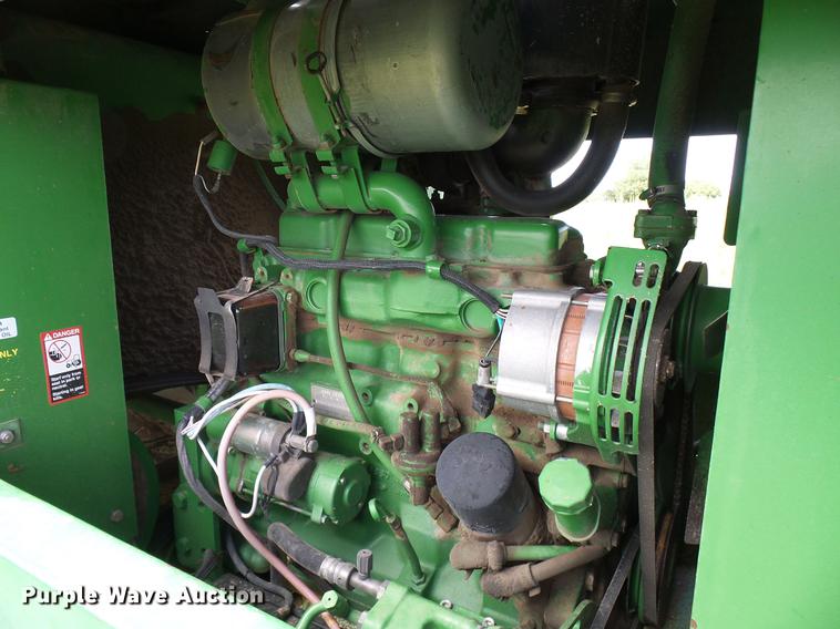 image for item DD8340 1994 John Deere 3830 windrower