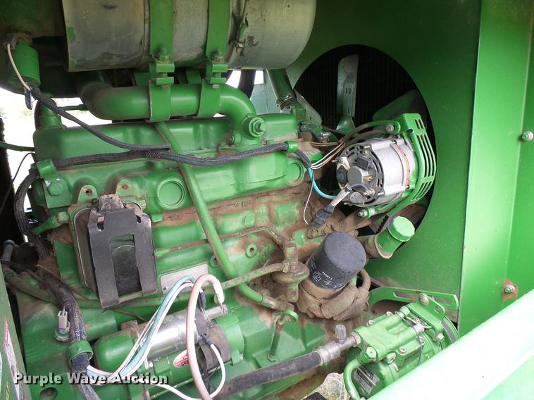 image for item DD8340 1994 John Deere 3830 windrower