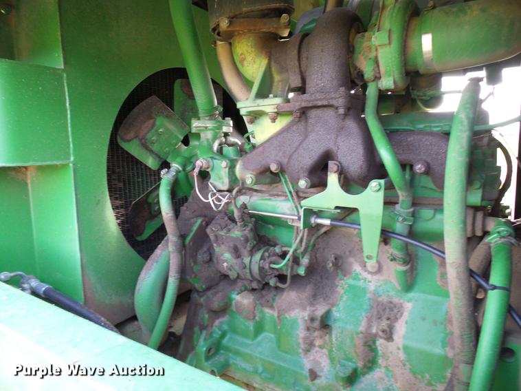 image for item DD8340 1994 John Deere 3830 windrower