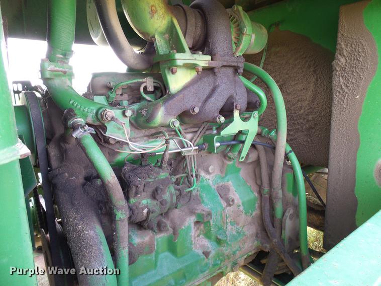 image for item DD8340 1994 John Deere 3830 windrower