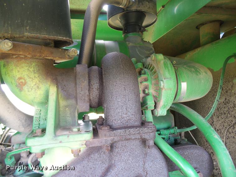 image for item DD8340 1994 John Deere 3830 windrower