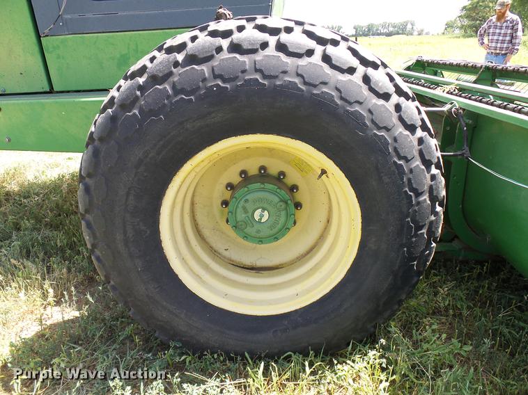 image for item DD8340 1994 John Deere 3830 windrower