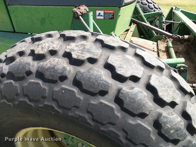 image for item DD8340 1994 John Deere 3830 windrower