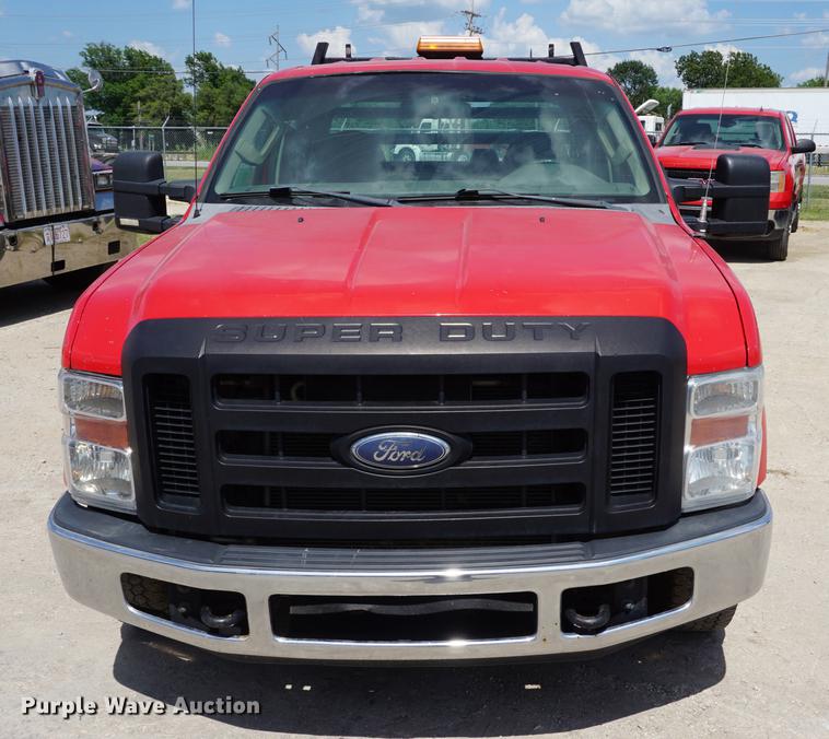 image for item DD7761 2008 Ford F250 Super Duty Crew Cab flatbed pickup truck