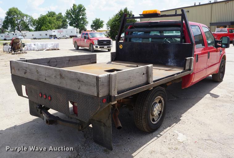 image for item DD7761 2008 Ford F250 Super Duty Crew Cab flatbed pickup truck
