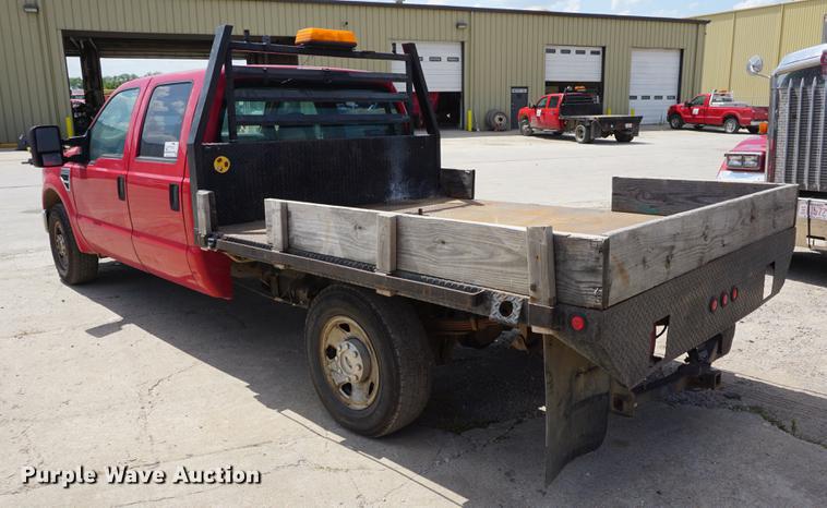 image for item DD7761 2008 Ford F250 Super Duty Crew Cab flatbed pickup truck