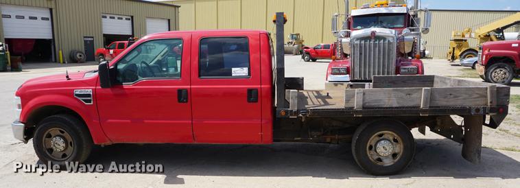 image for item DD7761 2008 Ford F250 Super Duty Crew Cab flatbed pickup truck
