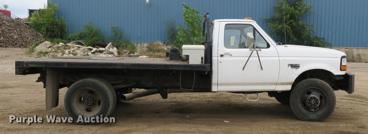image for item DE3769 1996 Ford F350 Super Duty XLT flatbed pickup truck