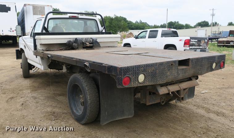 image for item DE3769 1996 Ford F350 Super Duty XLT flatbed pickup truck