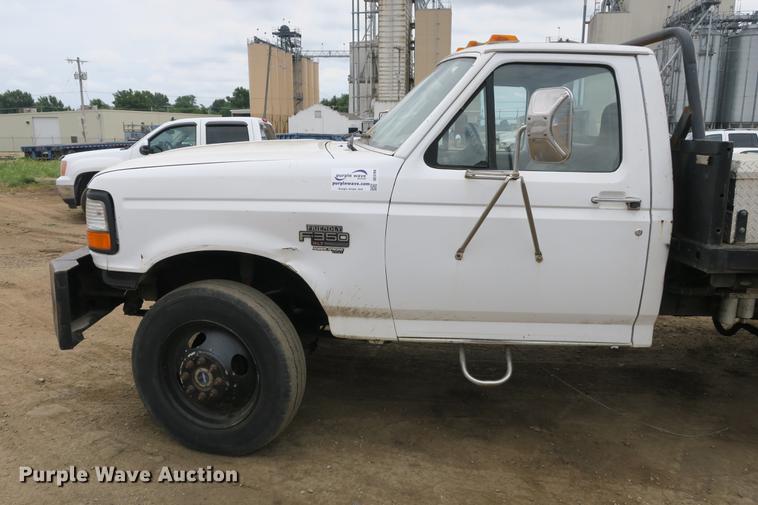 image for item DE3769 1996 Ford F350 Super Duty XLT flatbed pickup truck