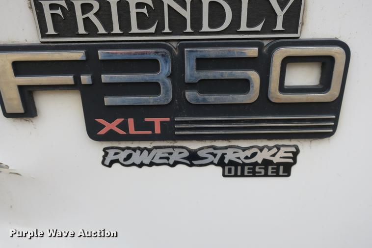 image for item DE3769 1996 Ford F350 Super Duty XLT flatbed pickup truck