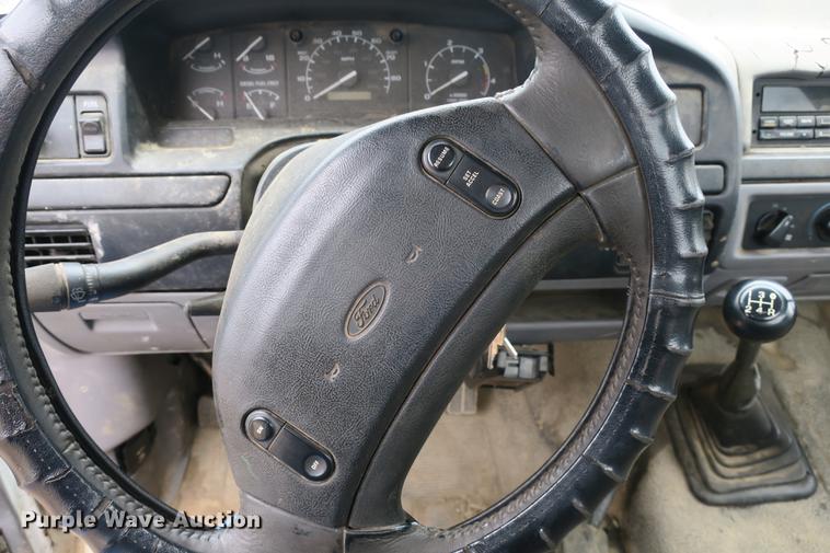 image for item DE3769 1996 Ford F350 Super Duty XLT flatbed pickup truck