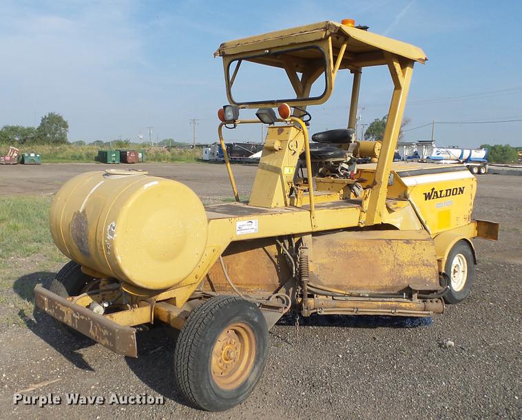 Waldon broom in Wichita, KS Item DE7213 sold Purple Wave