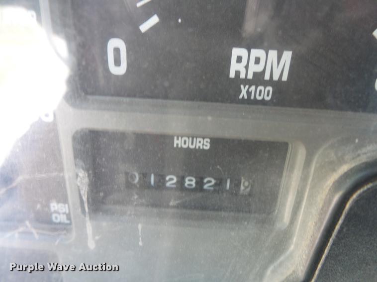 image for item DV9447 2000 International 4700 rollback truck