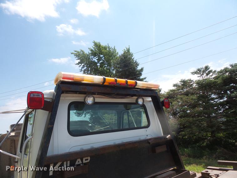 image for item DV9447 2000 International 4700 rollback truck