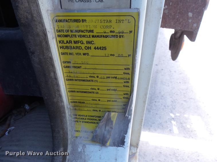 image for item DV9447 2000 International 4700 rollback truck