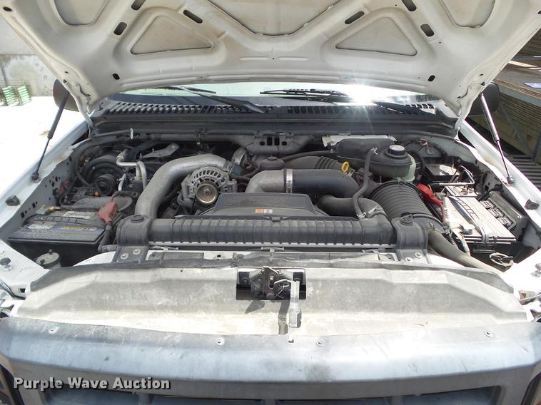 image for item DZ9399 2006 Ford F250 Super Duty SuperCab flatbed pickup truck