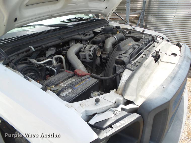 image for item DZ9399 2006 Ford F250 Super Duty SuperCab flatbed pickup truck