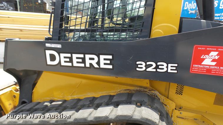 image for item DX9367 2016 John Deere 323E skid steer