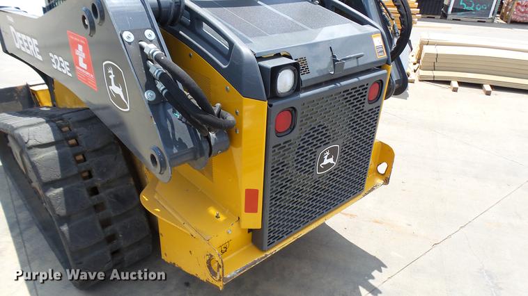 image for item DX9367 2016 John Deere 323E skid steer