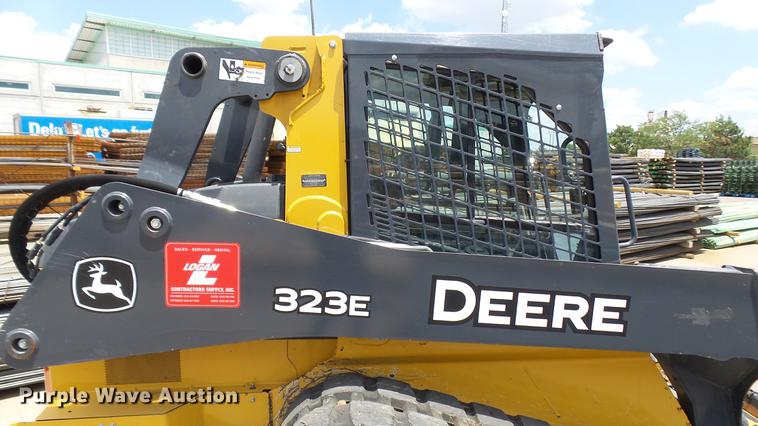 image for item DX9367 2016 John Deere 323E skid steer