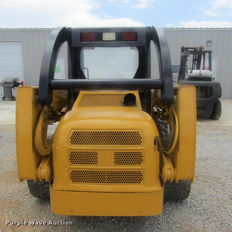 image for item EB9608 1999 John Deere 240 skid steer