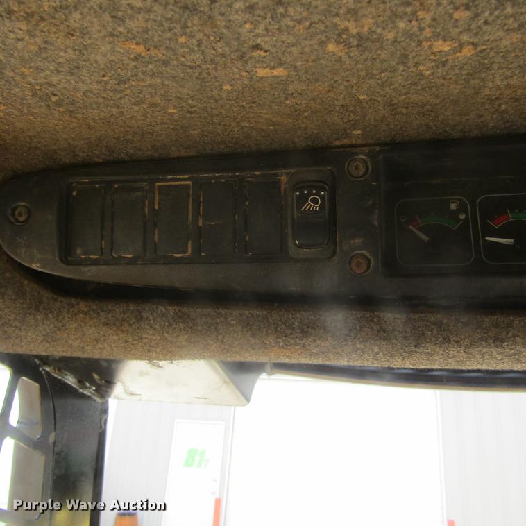 image for item EB9608 1999 John Deere 240 skid steer