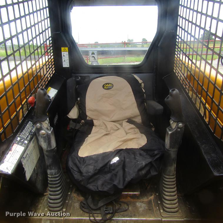 image for item EB9608 1999 John Deere 240 skid steer