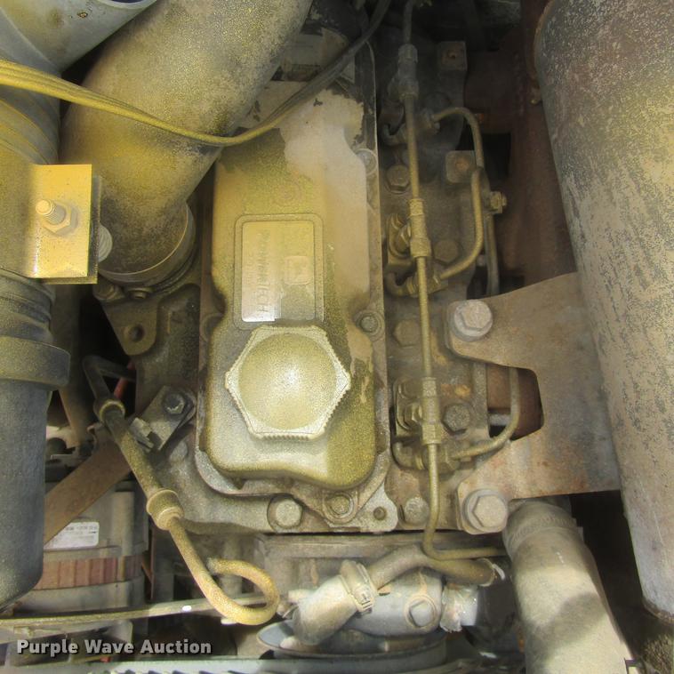 image for item EB9608 1999 John Deere 240 skid steer