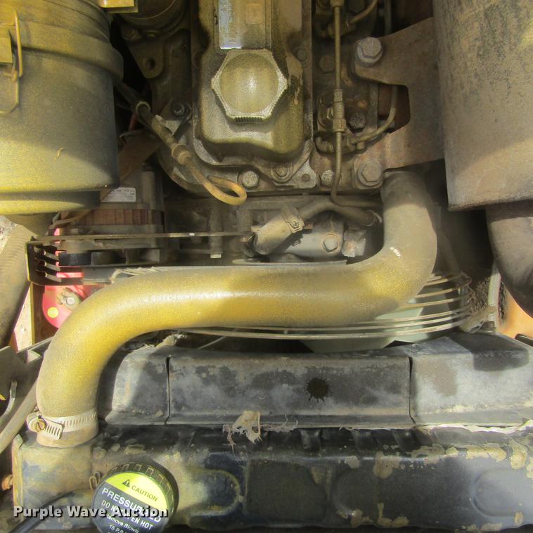 image for item EB9608 1999 John Deere 240 skid steer