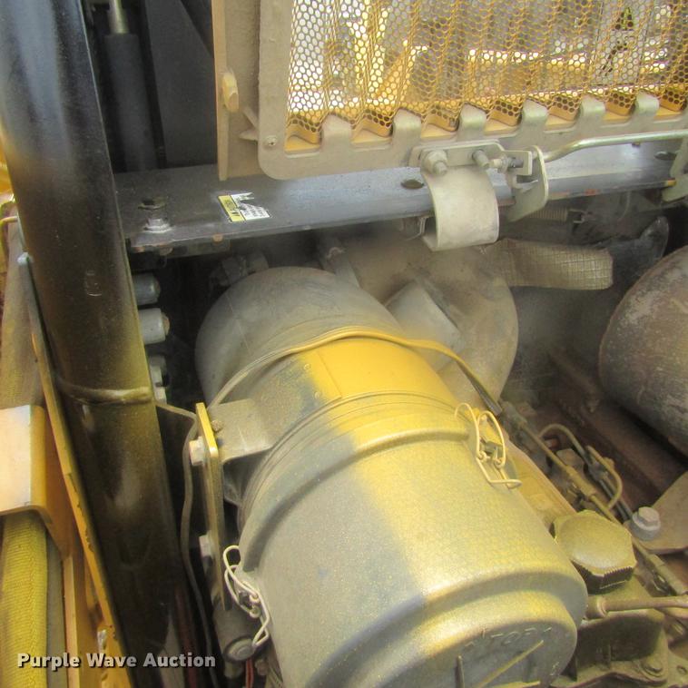 image for item EB9608 1999 John Deere 240 skid steer