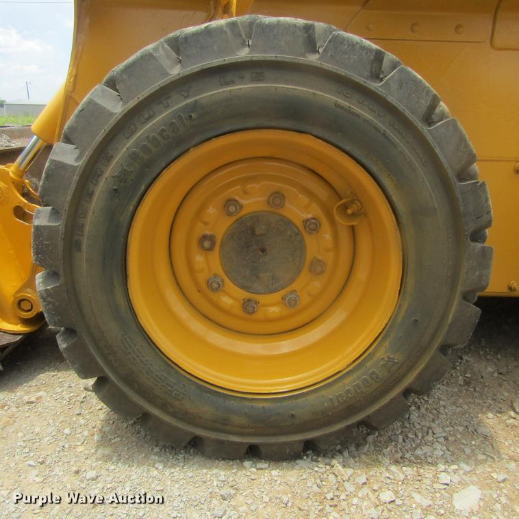 image for item EB9608 1999 John Deere 240 skid steer