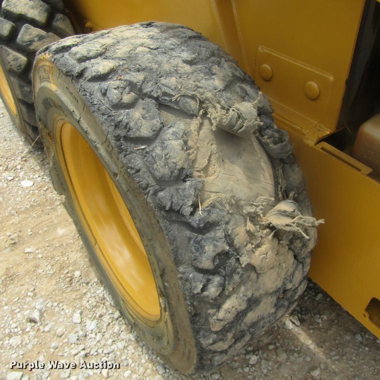 image for item EB9608 1999 John Deere 240 skid steer