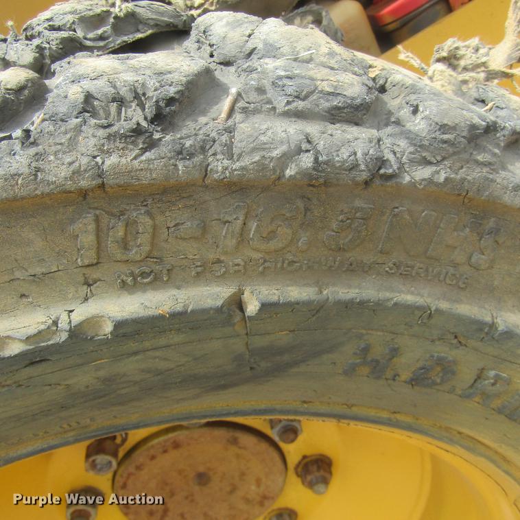 image for item EB9608 1999 John Deere 240 skid steer