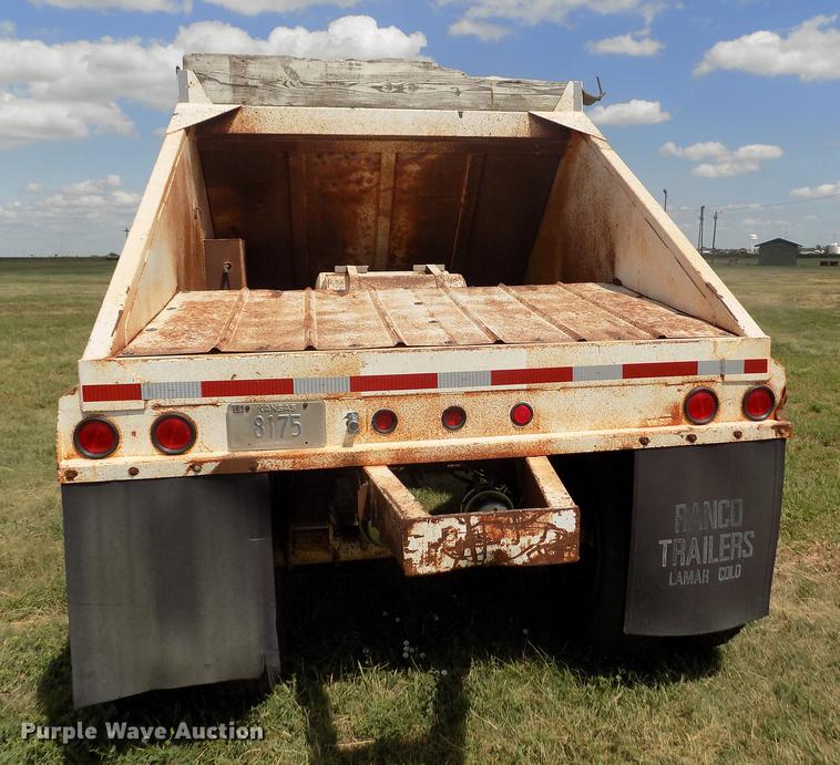 image for item DB9239 1985 Ranch Manufacturing Co bottom dump trailer