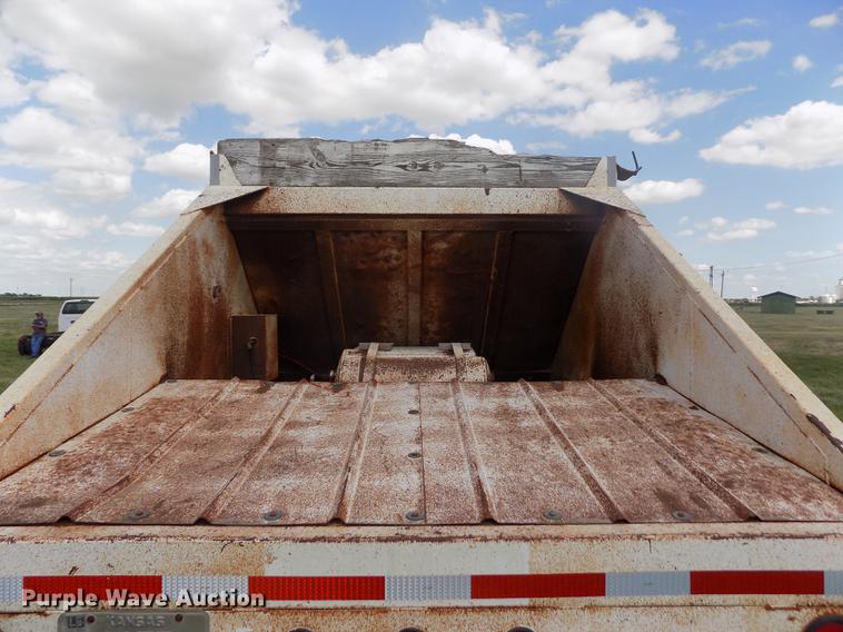 image for item DB9239 1985 Ranch Manufacturing Co bottom dump trailer