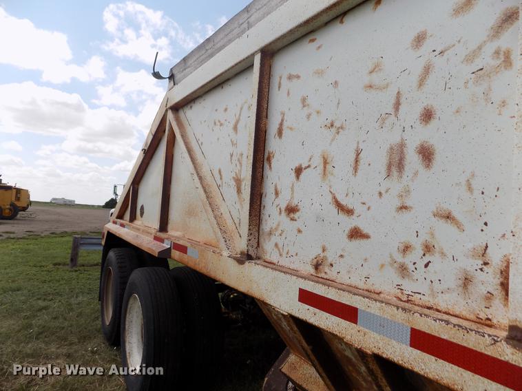image for item DB9239 1985 Ranch Manufacturing Co bottom dump trailer