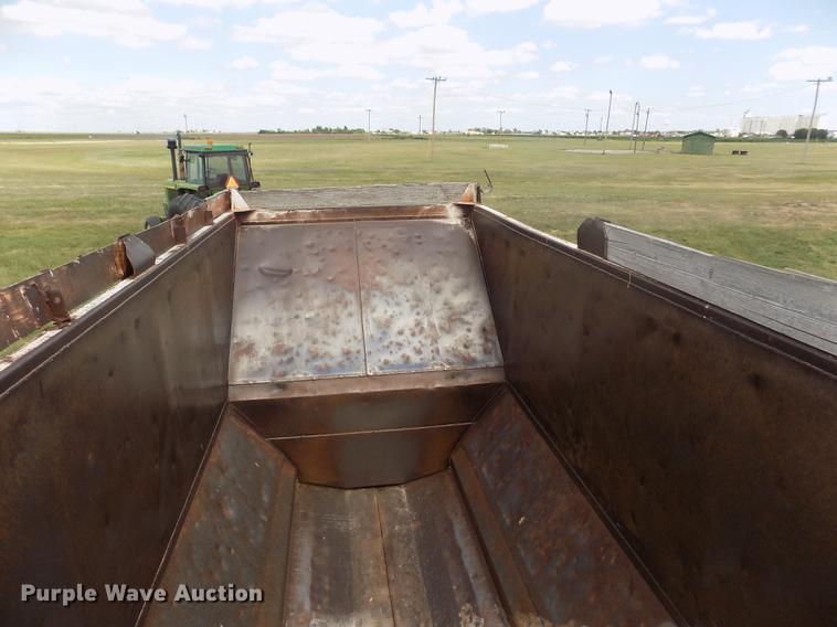image for item DB9239 1985 Ranch Manufacturing Co bottom dump trailer