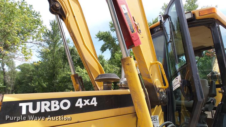 image for item DD7273 1997 John Deere 310SE backhoe