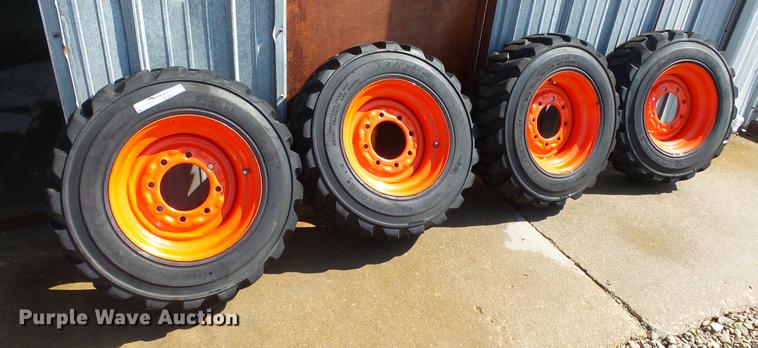 image for item EF9227 (4) 10-16.5 tires and wheels