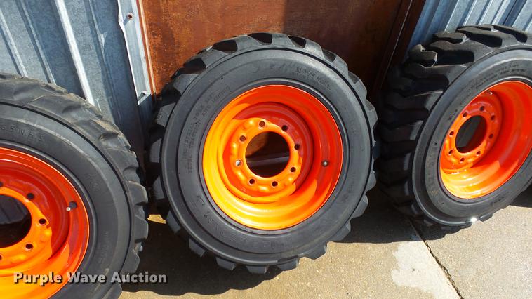 image for item EF9227 (4) 10-16.5 tires and wheels